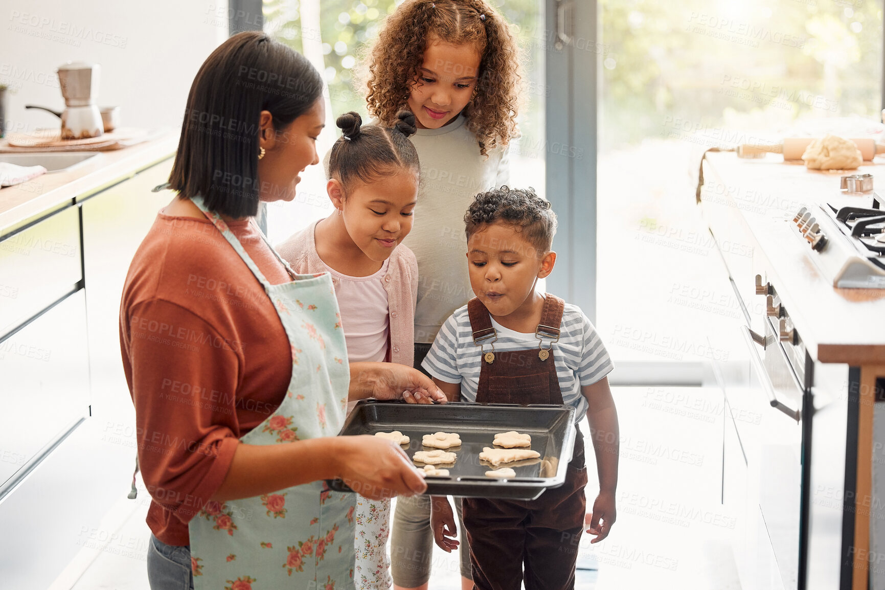 Buy stock photo Mother, children or baking of cookies by stove for cake recipe, dessert snack and bonding in kitchen. Happy family, woman or curious kids in home with biscuits in pan or cooking sweet treat with love