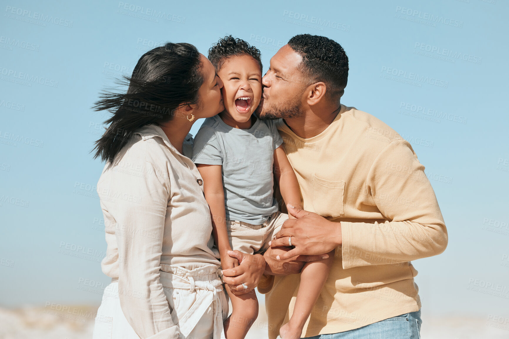 Buy stock photo Love, kiss and support with family at beach for travel destination, solidarity and summer vacation. Relax, tropical and adventure with parents and child for holiday, bonding and happiness together