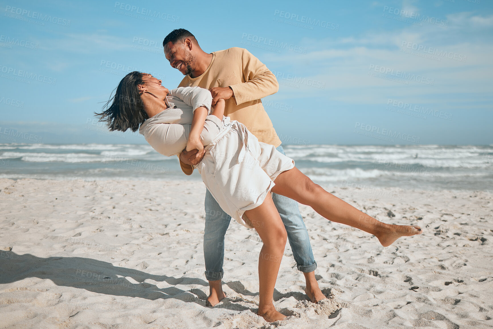 Buy stock photo Dance, love and smile with couple on beach together in summer for dating, honeymoon or romance. Holiday, travel or vacation with happy man and woman having fun on sand at tropical island paradise