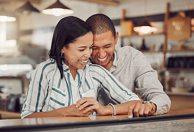 Buy stock photo Date, laughing and love with couple in coffee shop together for bonding, relationship or romance. Hug, funny or smile with happy man and woman in cafe or restaurant for comedy, comfort or relaxation