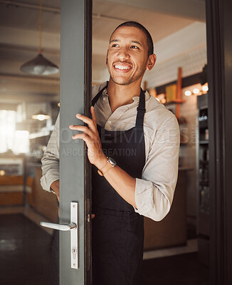 Buy stock photo Happy, man and business owner at entrance of cafe with welcome, customer service and hospitality industry. Smile, male waiter and open door with invitation, startup and breakfast store for restaurant