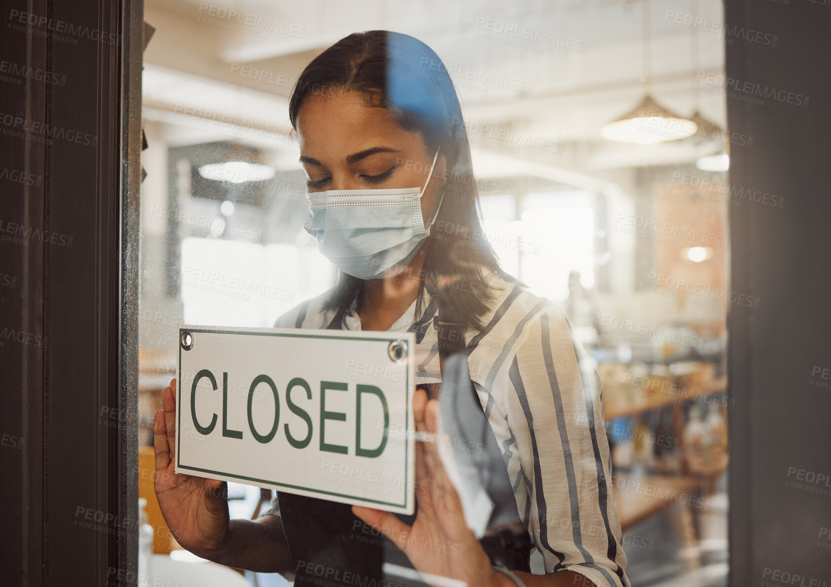 Buy stock photo Closed, sign and waitress by door of cafe for announcement, information and notice of service time. Entrance, woman and small business board for public communication, message and update at restaurant