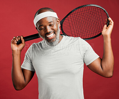 Buy stock photo Sport, man and happy with tennis racket in studio for competition match, exercise and workout. Mature athlete, black person and smile on red background for hobby, game fitness and confident trainer