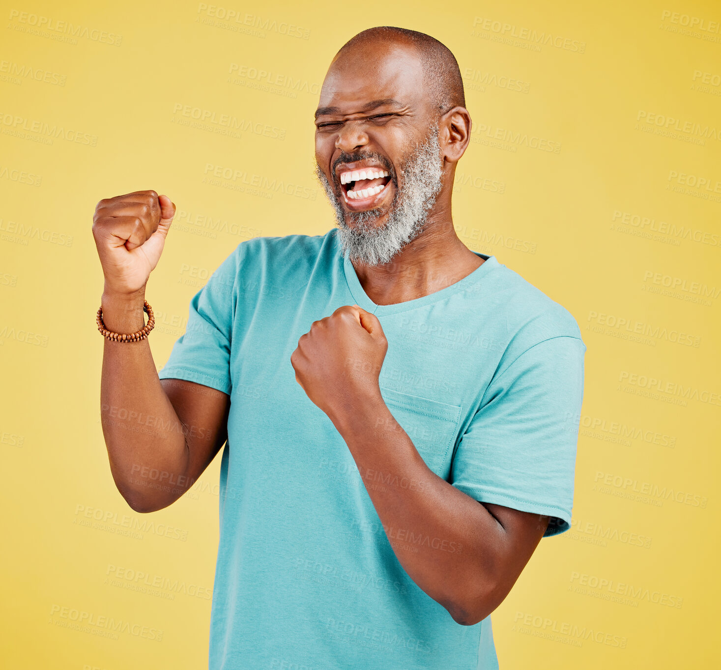 Buy stock photo Excited, fist pump and winner with mature black man in studio isolated on yellow background for celebration. Deal, motivation and success with happy senior person cheering for bonus, goals or target