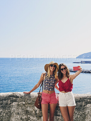 Buy stock photo Woman, friends and selfie on vacation by ocean, promenade and happy with mockup space in blue sky. Girl, people and outdoor with photography, memory and profile of hills, sea and buildings in Italy