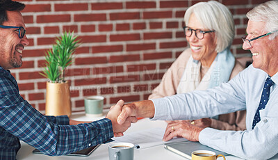 Buy stock photo Senior, couple and handshake with consultation in meeting for retirement planning success or mortgage deal. People, financial advisor and shaking hands with client for legal investment and thank you