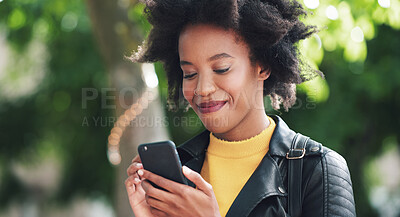 Buy stock photo Black woman, smile and phone outdoor at park with reading notification, text message and mobile chat. Person, happy and smartphone in nature for communication, social media scroll and watching video