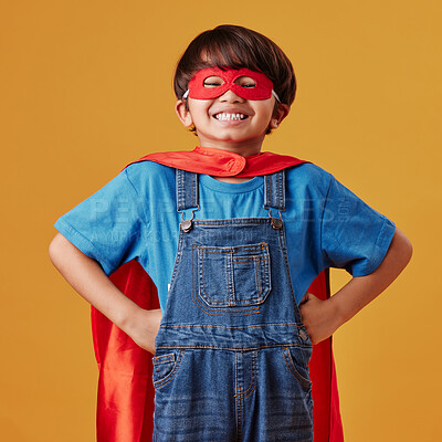 Buy stock photo Boy, portrait and superhero costume on studio background, confident and playing fantasy game. Male person, child and character to protect or serve justice, hero courage and proud fighter for power