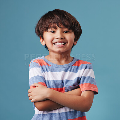 Buy stock photo Japanese kid, boy and arms crossed in studio background for fashion with fun, outfit and swag in Japan. Male person, child and smile or happy on portrait in confidence with trendy clothes and style