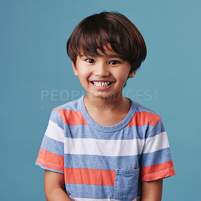 Buy stock photo Japanese kid, boy and satisfied in studio background for fashion with fun, outfit and swag in Japan. Male person, child and smile or happy on portrait in confidence with trendy clothes and style