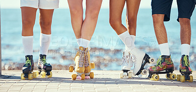 Buy stock photo Roller skates, friends and beach with a group of people on the promenade at the beach with the sea in the background. Summer, fun and lifestyle with a skaters skating outside during a sunny day