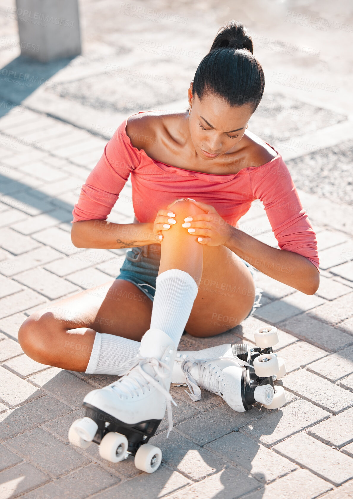 Buy stock photo Roller skate and sports knee injury for girl hurt on the floor after travel, ride and skate on sidewalk. Emergency, accident and training woman learning to roller blade hurt on the ground after fall