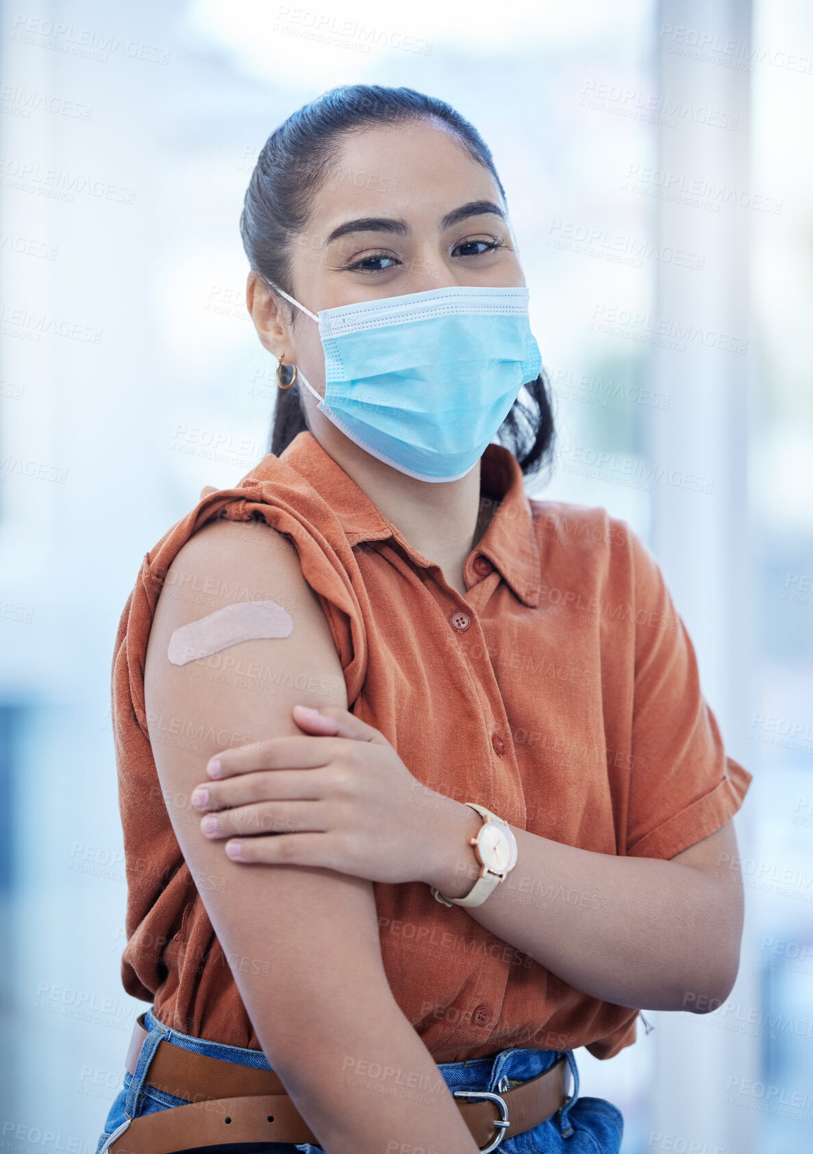 Buy stock photo Covid, vaccine and health with woman and for medical safety, wellness and virus protection. Medicine, patient and face mask with girl and adhesive bandage on arm for injection, pandemic and treatment