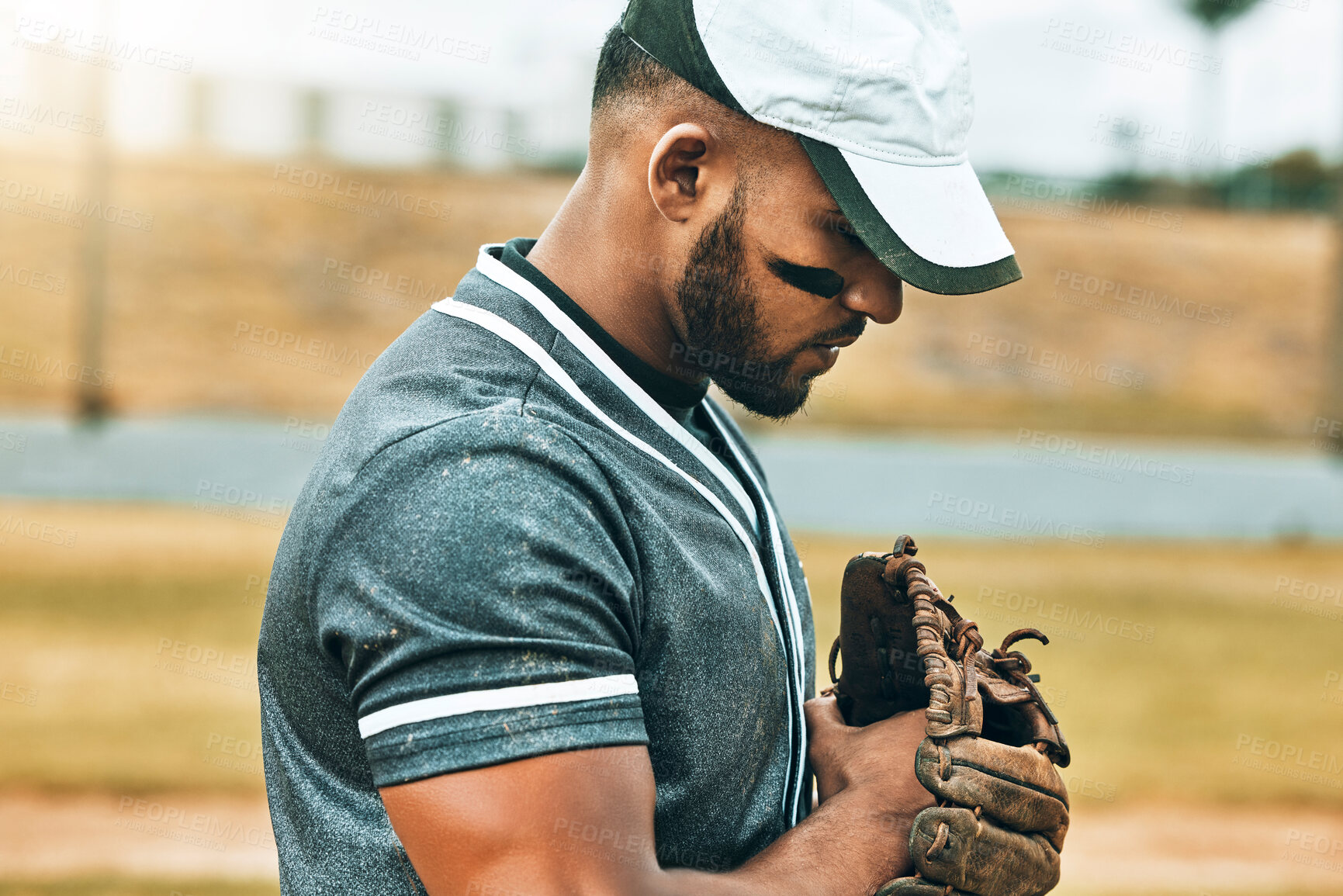 Buy stock photo Man, baseball and glove with focus, game and determination as fielder, pitcher or baseball player. Athlete, sport and training for wellness, fitness and health in competition, sports or match outdoor