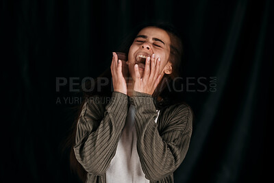 Buy stock photo Woman with anxiety, crying and bipolar for crazy psychology on black studio background. Girl with trauma, schizophrenia and mental health shouting for fear