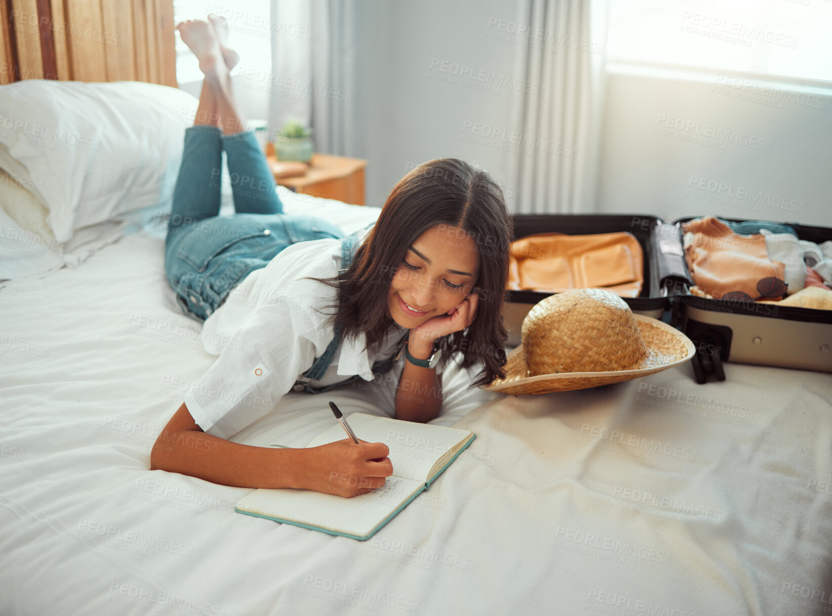 Buy stock photo Bed, woman and book for writing before travel, vacation and adventure, diary and memories in her home. bedroom, journal and girl write notes of travelling, journey and experience after holiday abroad