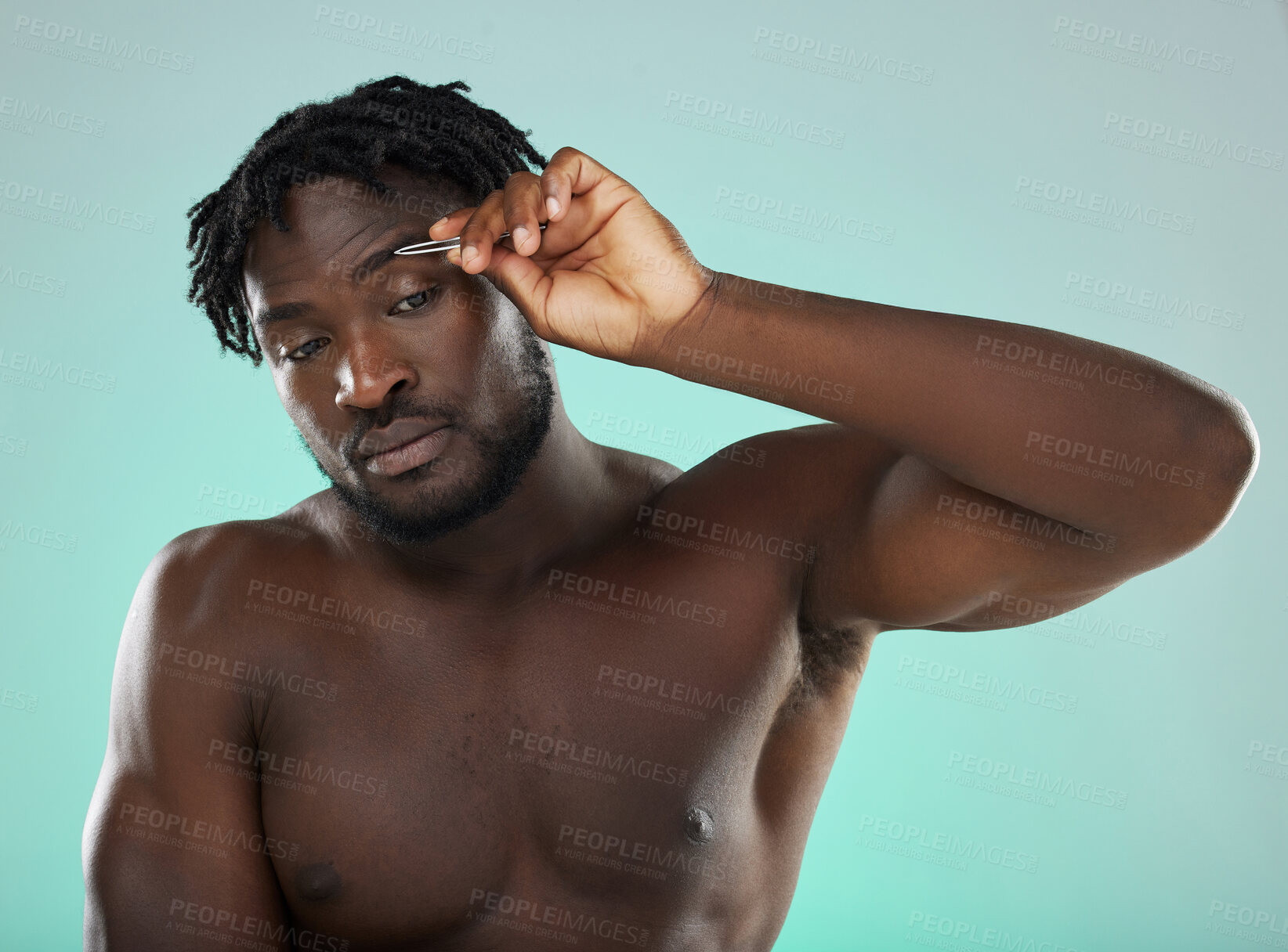 Buy stock photo Black man, studio and tweezer for eyebrows, cosmetic beauty and grooming by blue background for wellness. Model, cosmetic and facial hair removal with metal tools for aesthetic, cleaning or self care