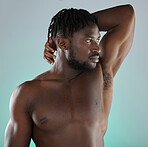 Beauty, health and man with armpit skincare hygiene or grooming isolated against a studio background. Natural, cosmetics and body care for healthy skin by a young, confident and African model