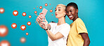 Diversity, social media icons or women take a selfie for content or online post on blue background. Love emojis, friends or happy girls take fun pictures together on mobile app or network in studio