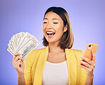 Money, phone and woman with wow for winning, finance or online savings, profit and cash prize. Success, lottery and winner or asian person on mobile, money fan and banking on studio purple background