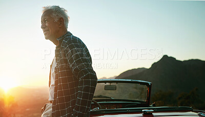 Buy stock photo Shot of a senior man out on a road trip