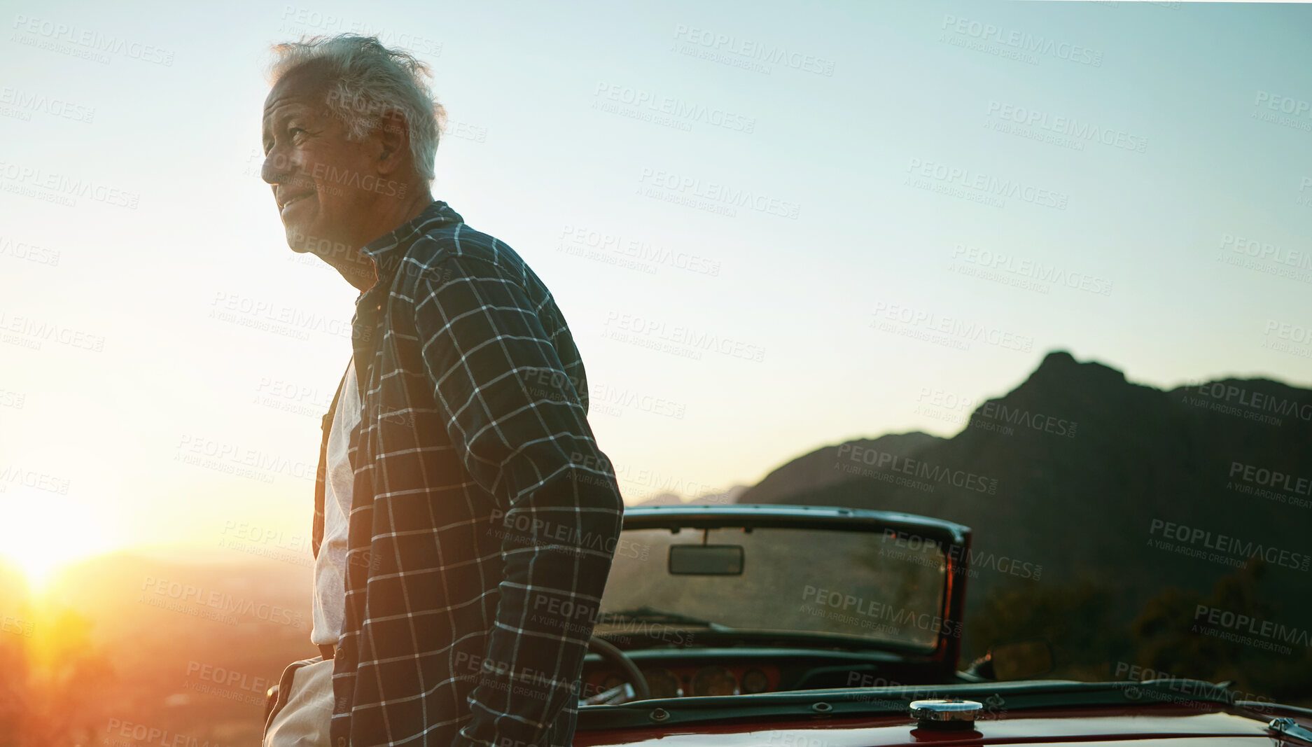 Buy stock photo Shot of a senior man out on a road trip