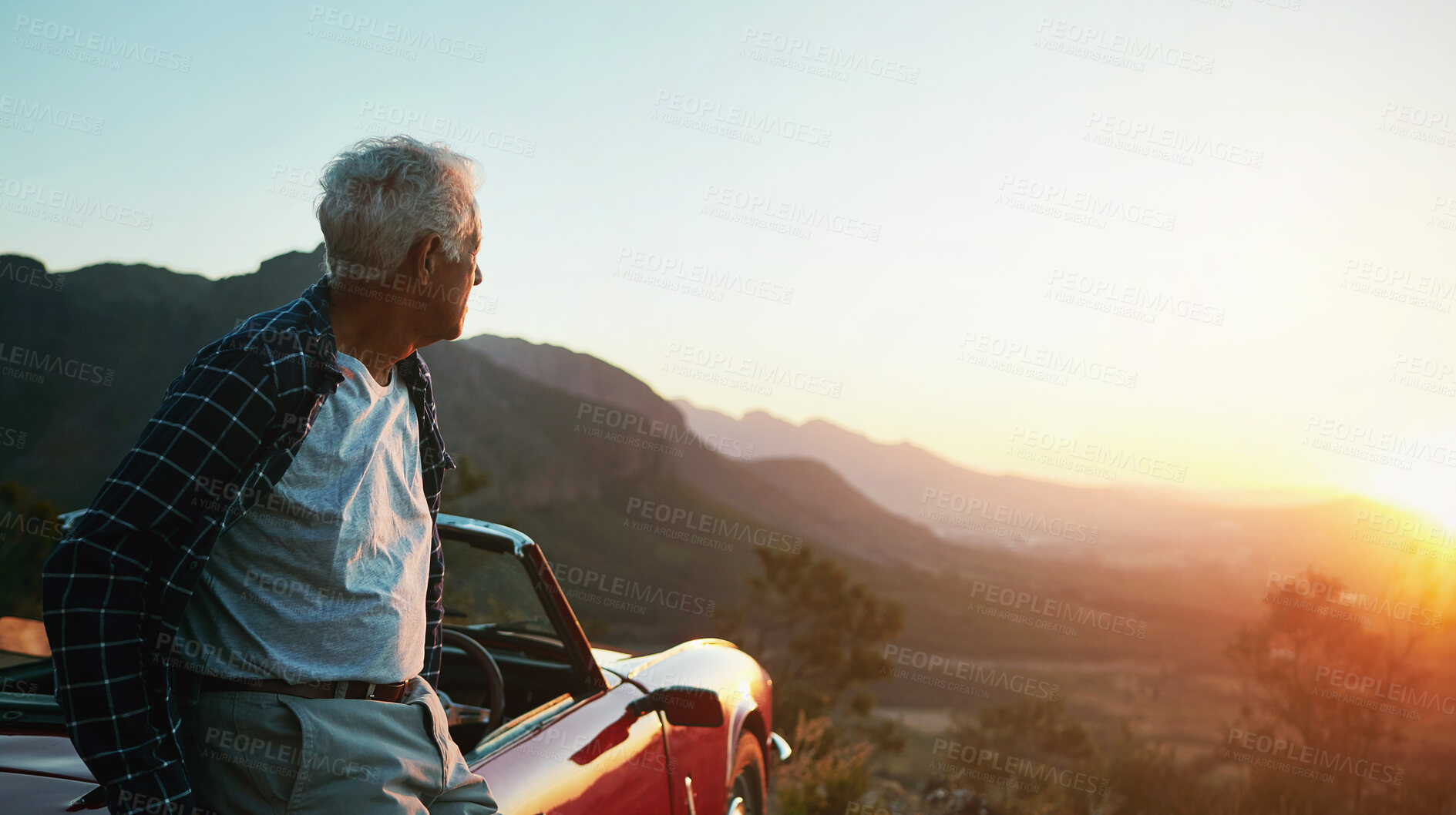 Buy stock photo Shot of a senior man out on a road trip