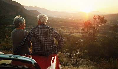 Buy stock photo Shot of a senior couple enjoying  a road trip