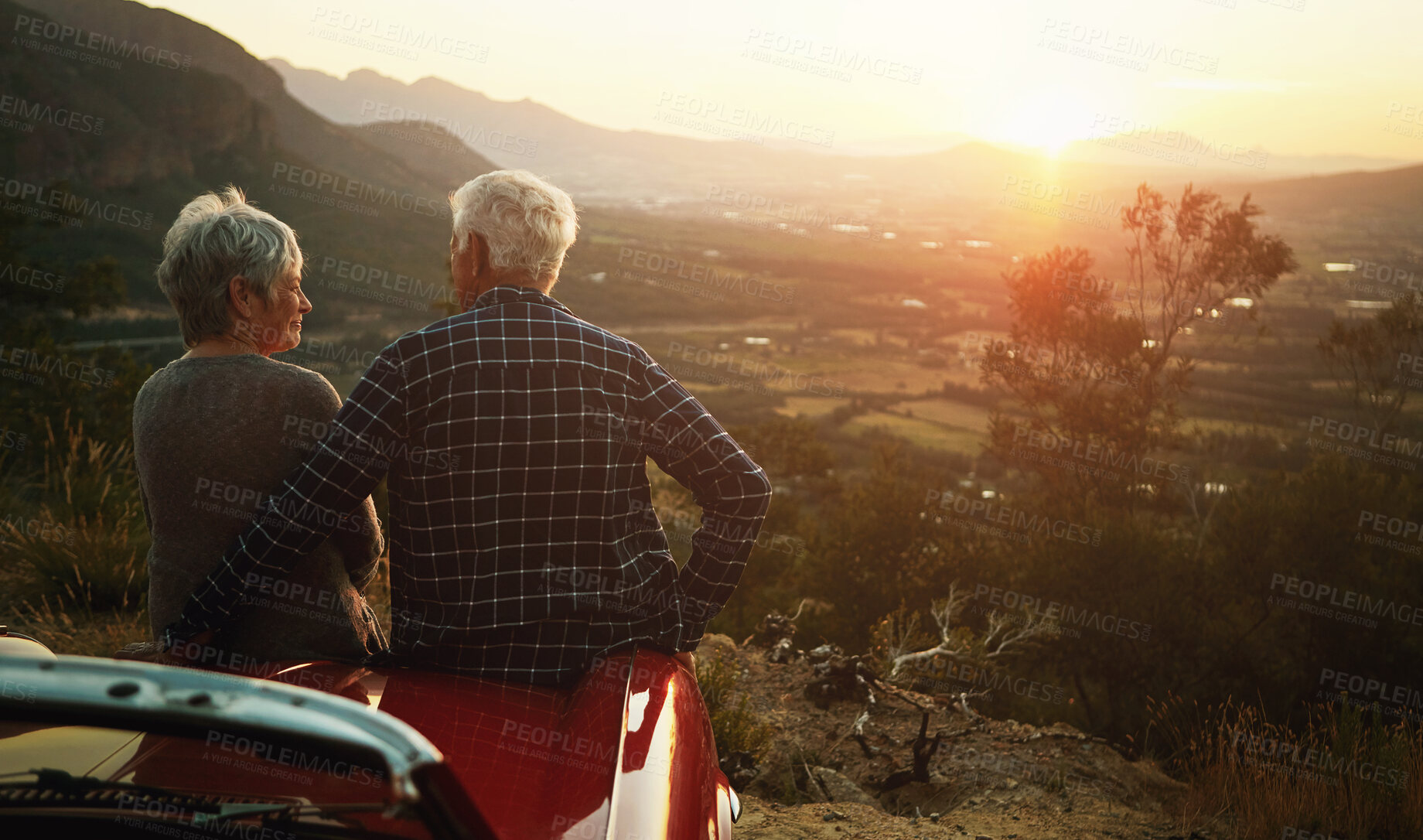 Buy stock photo Shot of a senior couple enjoying  a road trip