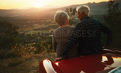 Buy stock photo Shot of a senior couple enjoying  a road trip