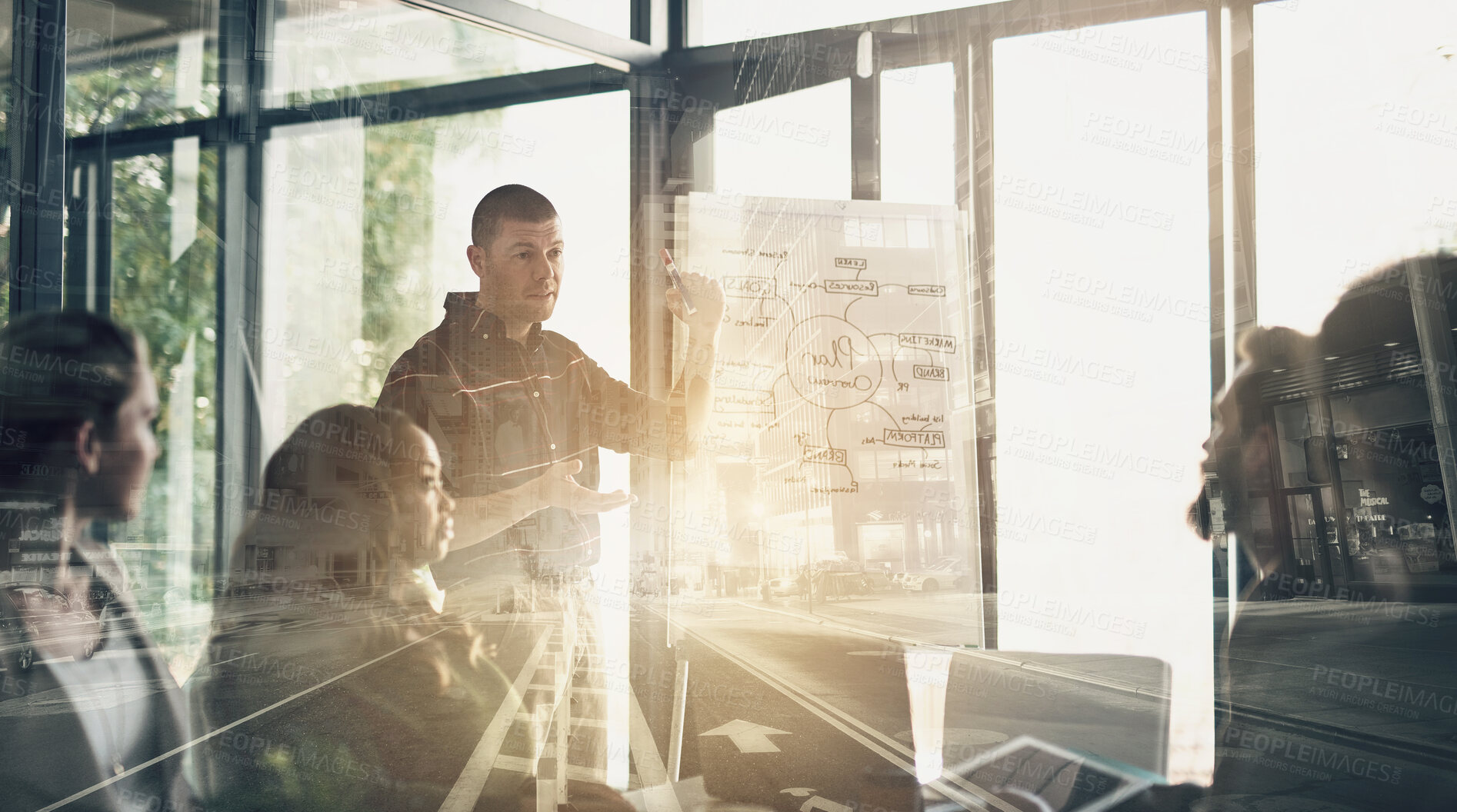 Buy stock photo Multiple exposure shot of a group of businesspeople having a meeting in an office superimposed over a cityscape