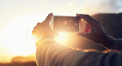 Buy stock photo Sunset, phone and hand of person with photography for travel blog, update and memory of vacation. Nature, sky and screen of technology with picture in evening for social media, post and adventure