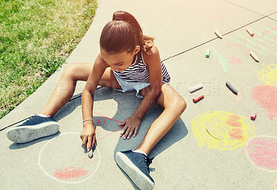 Buy stock photo Girl, child and drawing on ground with chalk at school for learning, development and creativity. Kid, art and happy in sunshine on sidewalk, path and writing with shape, lines and pattern at academy