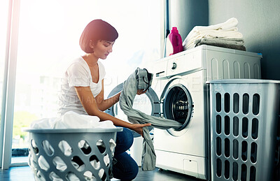 Buy stock photo Washing machine, laundry and woman cleaning clothes in home for hygiene or housekeeping. Chores, dryer and person take fabric in electrical appliance for housework or fresh textile in basket in house