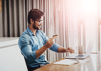 Buy stock photo Happy man, credit card and laptop in work from home office, online shopping and fintech payment of budget. Male person, computer and ecommerce banking for finance, investment and internet transaction