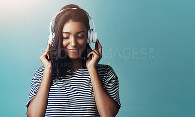 Buy stock photo Woman, studio and headphones with happy music, listening and streaming podcast for calm with gen z. Radio audio, technology for song entertainment with sound, Indian female person on background