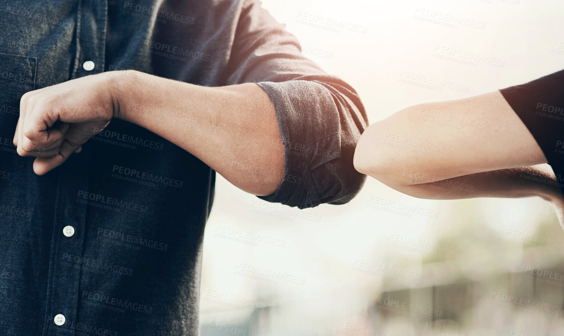 Buy stock photo Closeup, man and woman elbow greeting to avoid the spread of coronavirus or COVID-19 infection and outdoors. Social distancing, health and wellness or fear of pandemic or meet in the street outside