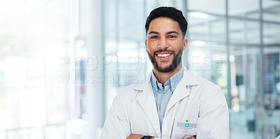 Buy stock photo Healthcare, doctor and portrait of happy man in hospital with confidence, pride or medical expertise. Male surgeon, medicare or smile in lobby for achievement, help or arms crossed for career success