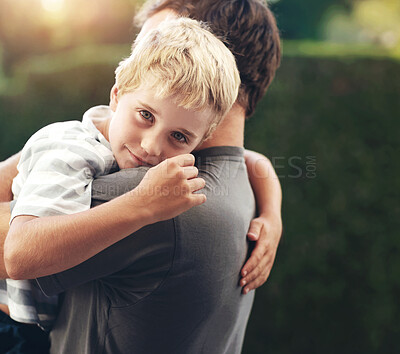 Buy stock photo Portrait of dad hugging kid in backyard, support and bonding together in comfort, care and love. Smile, father and face of child in garden with happy relationship, trust for man and boy or family