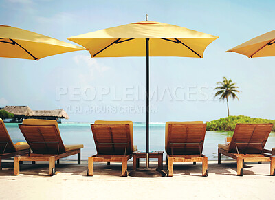 Buy stock photo Tropical, deck chairs and umbrella on beach for luxury, travel or summer villa for vacation or holiday. Maldives, leisure and ocean for resort, relax and island with sunshine, outdoor or caribbean 
