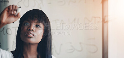 Buy stock photo Cropped shot of a businesswoman doing planning on a glass wall