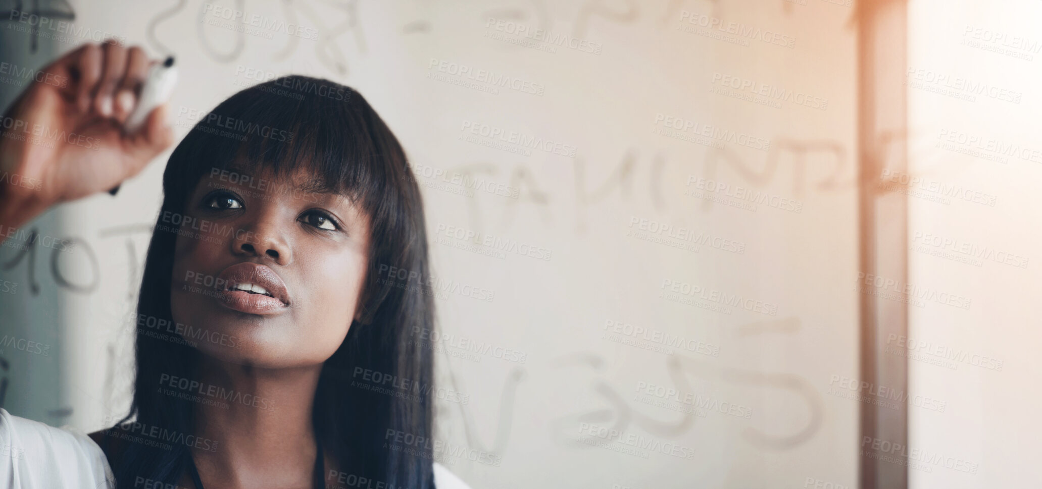 Buy stock photo Cropped shot of a businesswoman doing planning on a glass wall