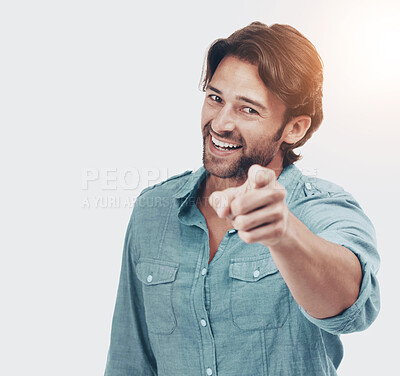 Buy stock photo White background, smile and portrait of man pointing in studio for motivation, choice and encouragement in studio. Marketing, advertising and mockup of male with hand gesture, point finger and sign