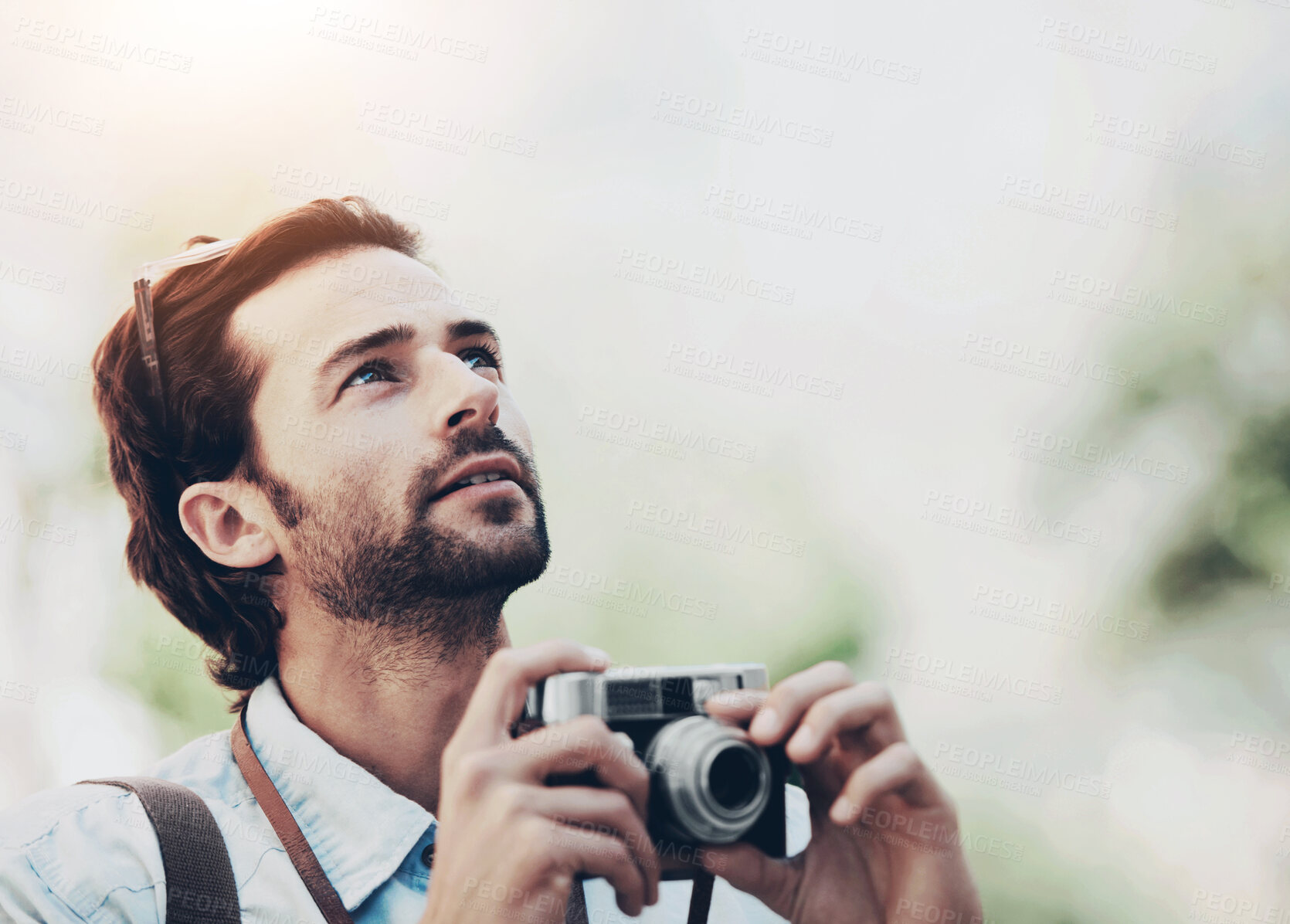 Buy stock photo Photographer, camera or man on holiday, vacation or trip for a fun summer adventure in Italy looking up. Bokeh mockup space, tourist or person with sightseeing in nature journey or park for travel