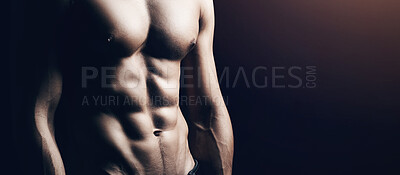 Buy stock photo Closeup, muscle and man with fitness, shirtless and bodybuilding on a dark studio background. Healthy person, model and guy with abs, sexy or exercise with workout, wellness and health with aesthetic