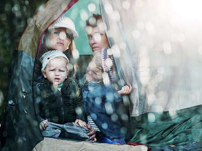 Buy stock photo Camping, family and parents with children in rain sad for adventure, holiday and vacation in winter outdoors. Disappointed, unhappy and mother, father and kids in tent with bad weather for travel