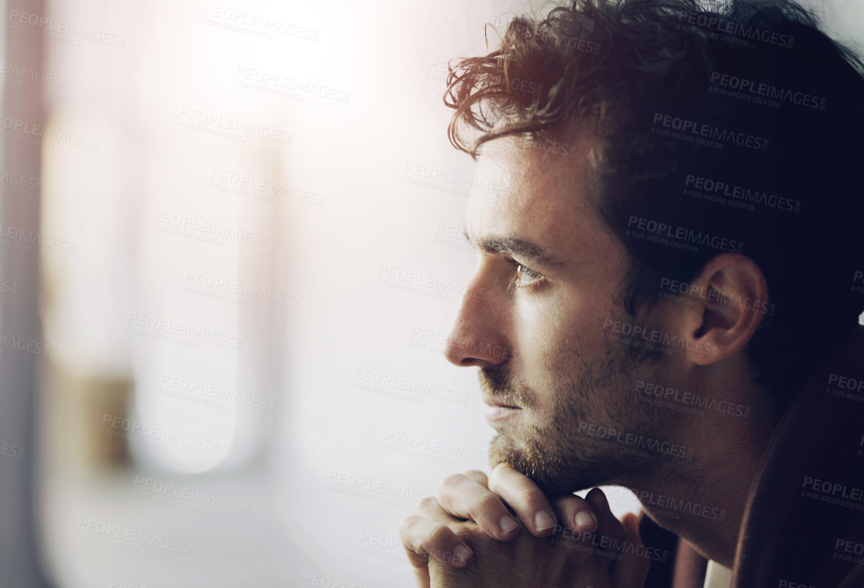 Buy stock photo Thinking, sad and a man looking depressed with a mental health problem, depression or anxiety. Fail, young and a guy sitting with thoughts of worry, stress and unhappy in a house, lonely and grieving