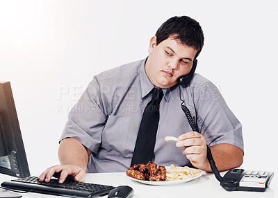 Buy stock photo Phone call, eating and plus size business man in studio on computer with food, lunch and unhealthy meal at desk. White background, office mockup and male worker with weight problem for for sales job