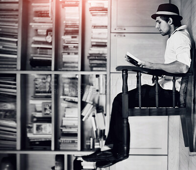 Buy stock photo A photograph turned sideways:  a man appears to be floating in the air while reading a book - perpective