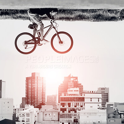 Buy stock photo A man on a bicycle hovers in the air over the rooftops of a city - perception